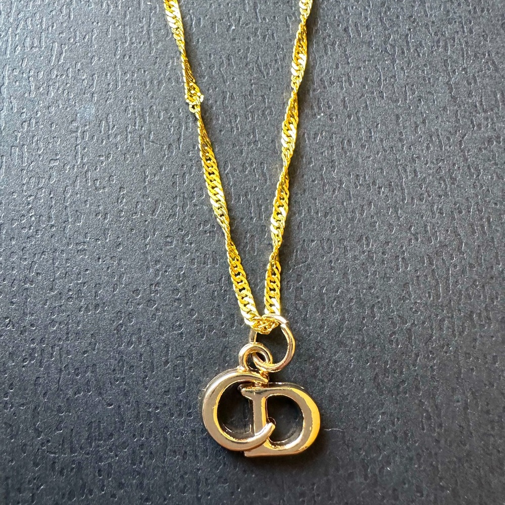 Gold Christian Dior pendant/charm!